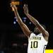 Michigan junior Tim Hardaway Jr. takes a shot during the first half of an NIT Season Tip-Off game at Crisler Center on Tuesday. Melanie Maxwell I AnnArbor.com